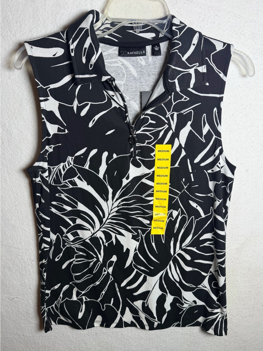 Rafaella Black & White Sleeveless Zip Polo Top with Botanical Print